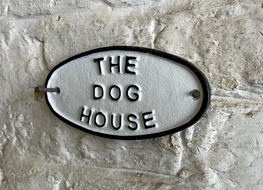The dog house plaque